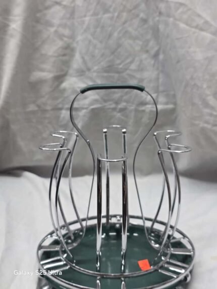 Enhance your kitchen or dining setup with this elegant gold metal glass holder stand. Designed for both style and function, it securely holds multiple glasses, keeping them organized and dry. Made from high-quality stainless steel with a gold finish and a